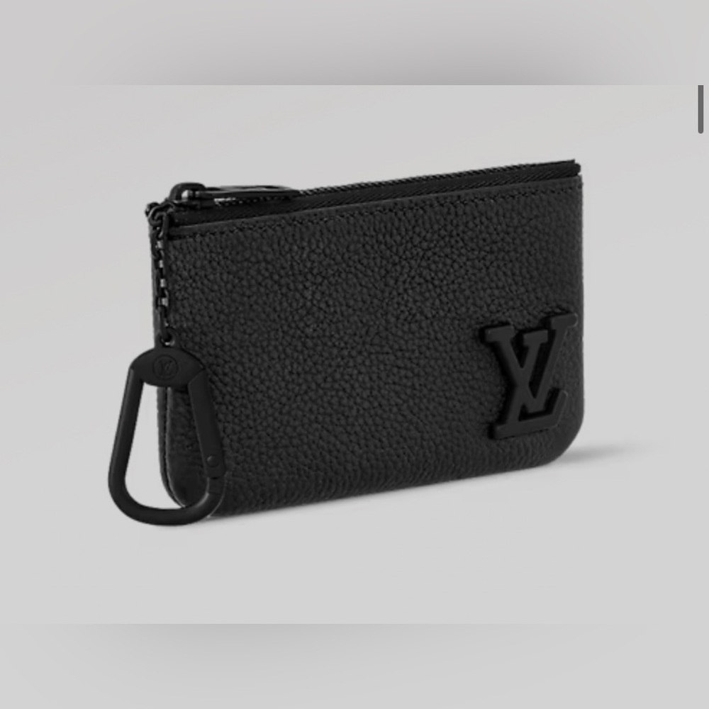 Louis Vuitton black leather key pouch.